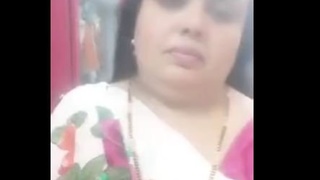 Horny mature woman satisfies herself in solo video