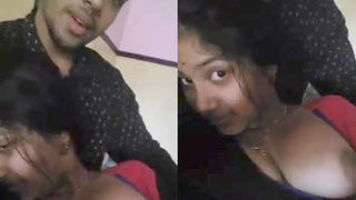 Cute Indian lover shows his girlfriend's breasts and makes her moan