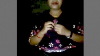 Watch a stunning bhabhi pleasure herself with her fingers in this hot video