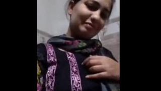 Indian girl and her lover in a steamy video