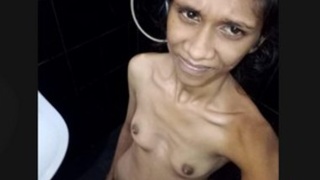 Lankan girl with small breasts takes a bath