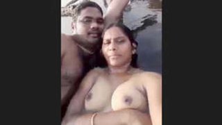 Indian couple enjoys a romantic getaway at the beach