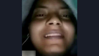 Cute Indian girl records herself on video camera