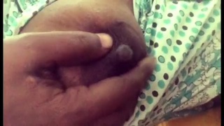 Desi aunty teases with her big boobs in a solo video