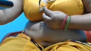 Chubby aunt with big boobs flaunts them on camera