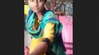 Enjoy watching a village girl with perky breasts in this online video