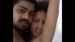 Indian couple enjoys passionate sex in a bed