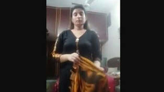 Pakistani bhabhi gets naughty in a tight suit in part 1 of the video