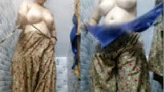 Chubby Indian girl flaunts her big boobs