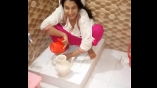 Desi aunty fucks and pees in front of the camera