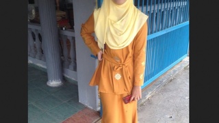 Muslim girl in hijab enjoys solo playtime