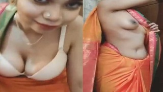 Sensual Bengali bhabi in saree shows off her curves in seductive striptease