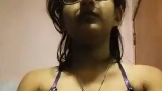 Cute Indian girl's sensuous striptease in desi style