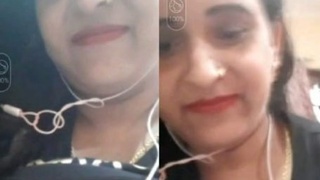 Watch a voluptuous bhabhi show off her big boobs in a video call