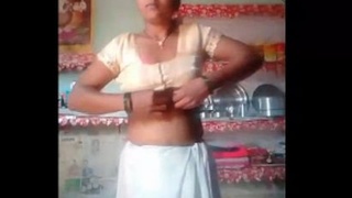 Desi bhabhi's solo fingering session in a village video