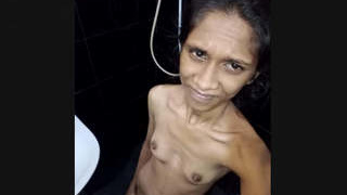 Lankan girl with small boobs soaps up in the shower